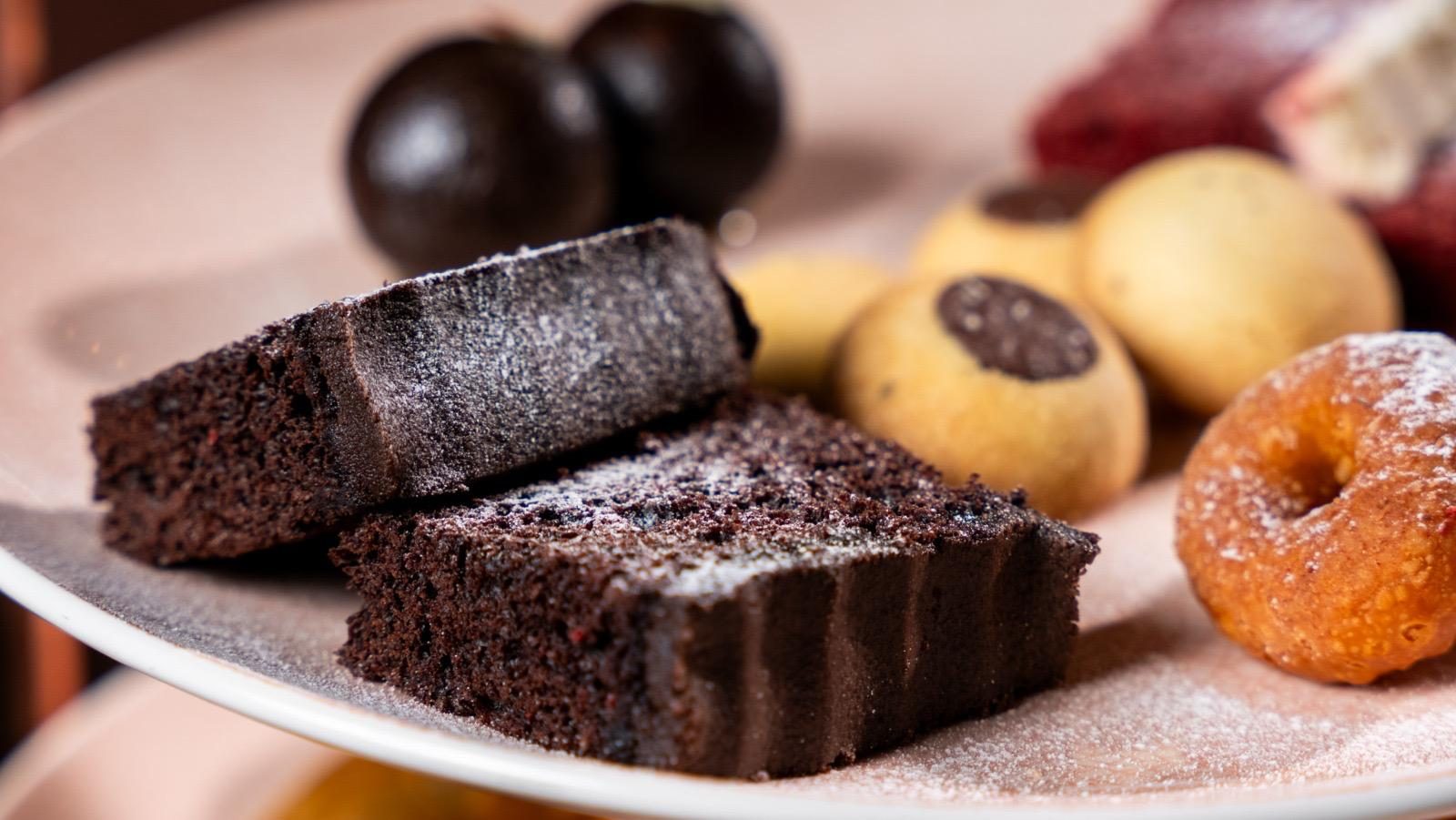 Chocolate cake, doughnut and Indian sweets